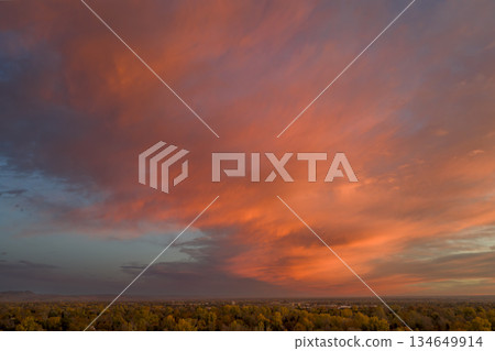 dramatic sunrise cloudscape over Fort Collins and foothills of Rocky Mountains,aerial fall scenery dramatic sunrise cloudscape over Fort Collins and foothills of Rocky Mountains,aerial fall scenery 134649914