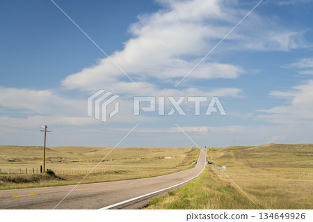highway across prairie of western Nebraska in late summer scenery 134649926