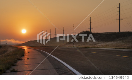 foggy sunrise over a highway in Nebraska Sandhills near Mullen foggy sunrise over a highway in Nebraska Sandhills near Mullen 134649943