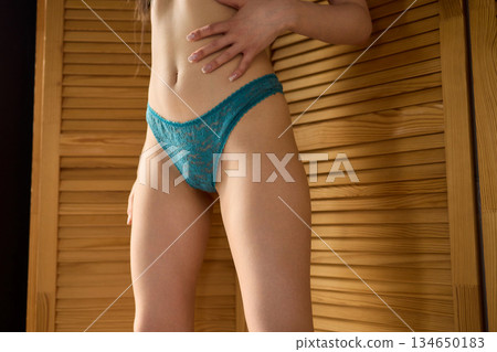 Elegant Seduction A Captivating and Charming Pose in Stylish and Alluring Lingerie Elegant Seduction A Captivating and Charming Pose in Stylish and Alluring Lingerie 134650183