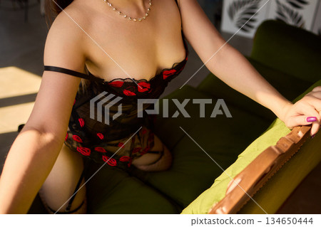 Elegant Seduction A Captivating and Charming Pose in Stylish and Alluring Lingerie Elegant Seduction A Captivating and Charming Pose in Stylish and Alluring Lingerie 134650444