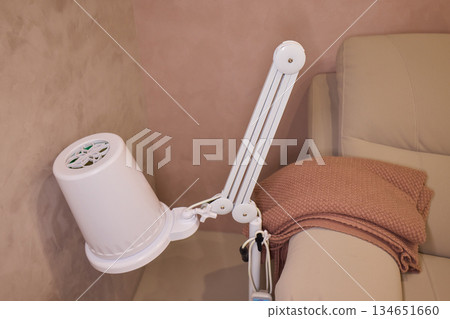 Salon lighting setup, Inviting salon space featuring adjustable lamp and soft hues, Clean and stylish pedicure area illuminated by flexible adjustable lamp with warm tones Pedicure hood Salon lighting setup, Inviting salon space featuring adjustable lamp and soft hues, Clean and stylish pedicure area illuminated by flexible adjustable lamp with warm tones Pedicure hood 134651660