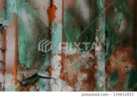 Abstract vintage textured background with peeling paint and vibrant colors. Layers of weathered paint, a blend of artistic hues. Abstract vintage textured background with peeling paint and vibrant colors. Layers of weathered paint, a blend of artistic hues. 134652053