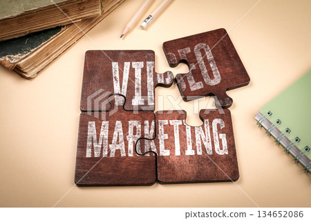Video Marketing Concept with Wooden Puzzle Pieces on Beige Background 134652086