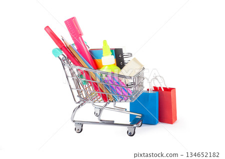Shopping cart filled with stationery supplies 134652182