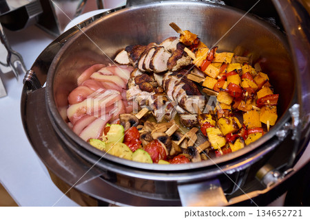 Meaty vegetable stir-fry, Cast iron skillet filled with savory beef and vegetables, Delicious and rustic beef and vegetable dish cooked to perfection in cast iron skillet Meaty vegetable stir-fry, Cast iron skillet filled with savory beef and vegetables, Delicious and rustic beef and vegetable dish cooked to perfection in cast iron skillet 134652721