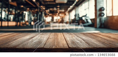 Panoramic Gym Scene with Wooden Tabletop and Industrial Warm Tones 134653088