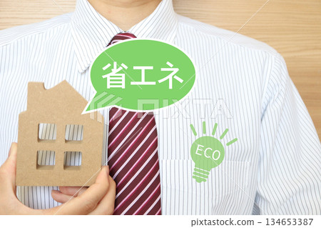 Businessman proposing energy-saving housing and ECO image concept. Businessman proposing energy-saving housing and ECO image concept. 134653387