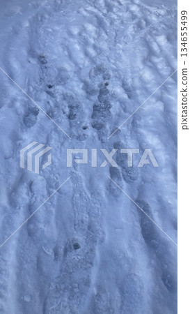 Snowy road 134655499