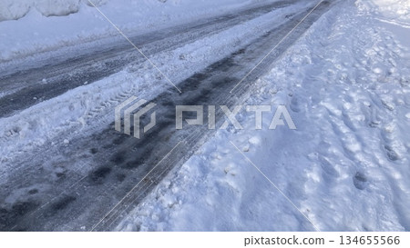 Snowy road 134655566