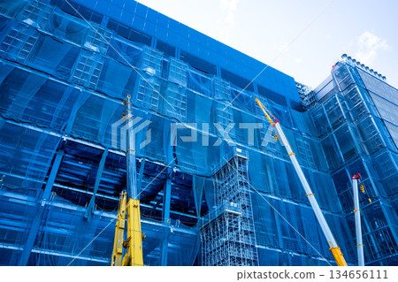 Huge building under construction and crane b-1 134656111