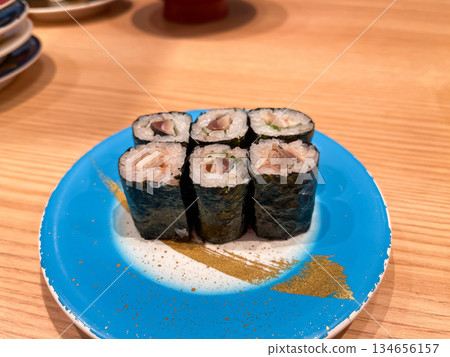 Japanese sushi. Mackerel and plum sushi roll. 134656157