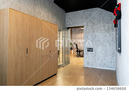 Modern office interior with wooden furniture and minimalist design for productivity 134656608