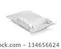 Blank silver foil snack packaging bag mockup isolated on a white background 134656624