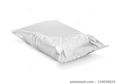 Blank silver foil snack packaging bag mockup isolated on a white background Blank silver foil snack packaging bag mockup isolated on a white background 134656624