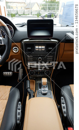 Interior view of a luxury car showcasing modern features and design elements Interior view of a luxury car showcasing modern features and design elements 134656678