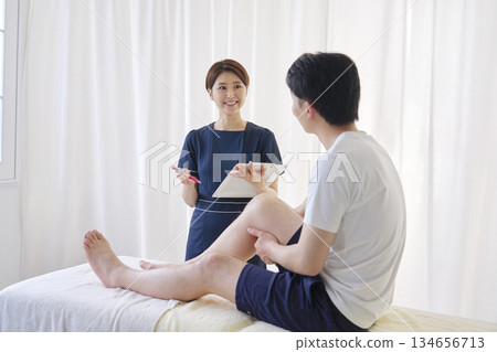 A man receiving a consultation at a beauty clinic A man receiving a consultation at a beauty clinic 134656713