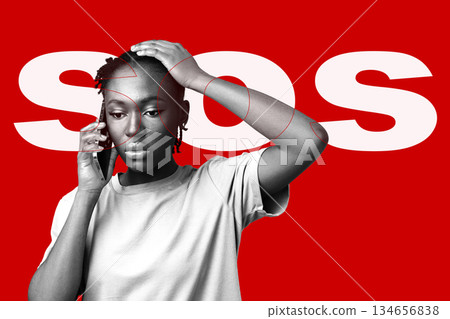 Person on phone showing concern for emergency situation in a vibrant setting 134656838