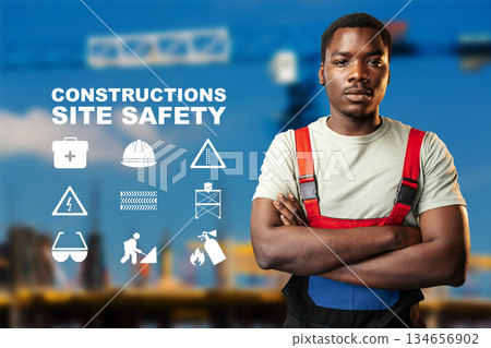 Construction worker promotes site safety with clear safety symbols and guidelines Construction worker promotes site safety with clear safety symbols and guidelines 134656902
