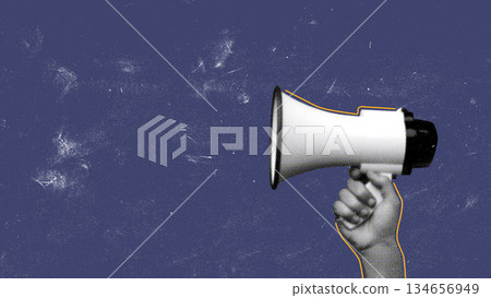 Hand holding a megaphone against a blue backdrop for communication and activism Hand holding a megaphone against a blue backdrop for communication and activism 134656949