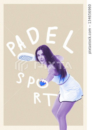 Dynamic padel player preparing to hit a ball on the court during a match 134656960