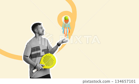 Man practices skillful moves with paddle and ball in a playful indoor setting 134657101