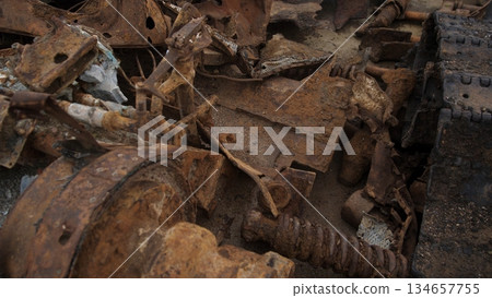 closeup of corroded treads and gears, detailed macro study showing flaked rust, pitted metal, seized bolts and worn sprocket, textured paint remnants and crusted residue, clinical lighting closeup of corroded treads and gears, detailed macro study showing flaked rust, pitted metal, seized bolts and worn sprocket, textured paint remnants and crusted residue, clinical lighting 134657755