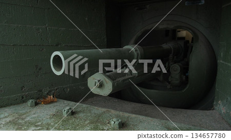 condition assessment of spent shell casings, ordnance inspector evaluating turret chamber and casings, inspection of interior turret breech area and recording shell casing conditions during survey 134657780