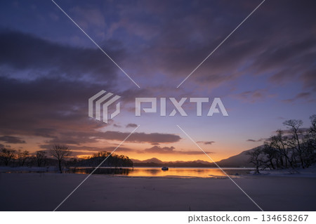 Winter dawn lake and sunrise Winter dawn lake and sunrise 134658267