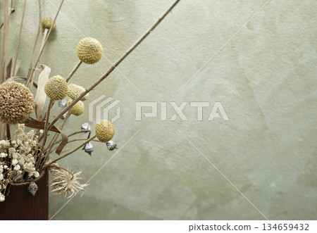 Real photo dry flowers in a vase decor old wall background boho interior neutral tones aesthetics 134659432
