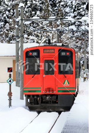 Aizu Railway Rapid AIZU Mount Express from Kinugawa Onsen to Aizu on frozen railway tracks Aizu Railway Rapid AIZU Mount Express from Kinugawa Onsen to Aizu on frozen railway tracks 134660725
