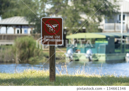 Sign prohibiting use of quadcopters in national park no drone area. Warning notice for using UAV 134661346