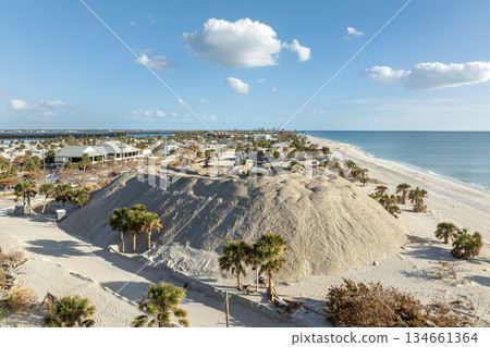 Sand piles after hurricane Milton at Englewood Beach on Manasota Key. Sand recipient site after storm surge as aftermath cleanup effort Sand piles after hurricane Milton at Englewood Beach on Manasota Key. Sand recipient site after storm surge as aftermath cleanup effort 134661364