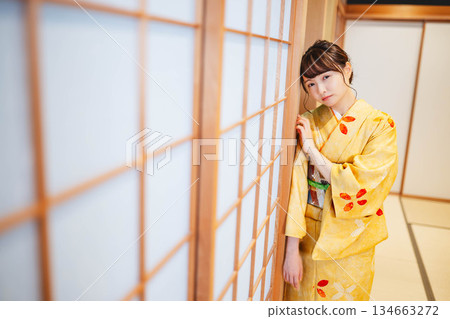 A young and beautiful kimono woman in a Japanese-style room A young and beautiful kimono woman in a Japanese-style room 134663272
