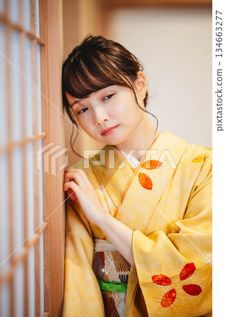A young and beautiful kimono woman in a Japanese-style room A young and beautiful kimono woman in a Japanese-style room 134663277