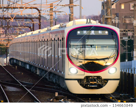 Keio 2000 series 2701F test run illuminated by the setting sun 134663849