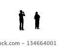 Silhouette of a person taking a commemorative photo 134664001