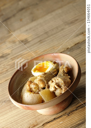 Sweet and spicy stewed chicken wings, radish and eggs Sweet and spicy stewed chicken wings, radish and eggs 134664051