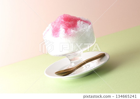 Shaved ice with strawberry syrup Shaved ice with strawberry syrup 134665241