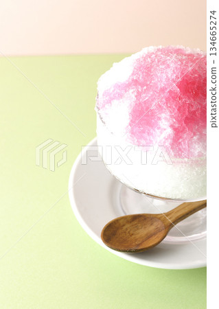 Shaved ice with strawberry syrup Shaved ice with strawberry syrup 134665274