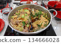 boiling meat and vegetables in hot pot 134666028