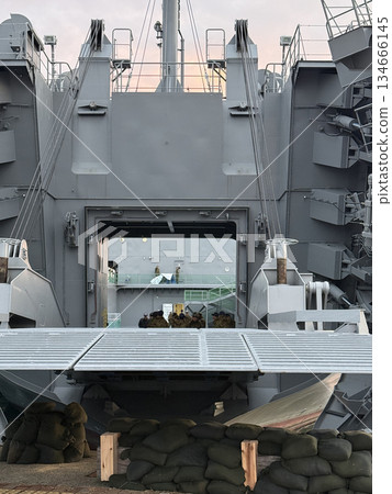 Opening and closing the bow ramp of a transport ship 134666145