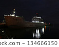 Night view of an anchored transport ship 134666150