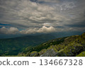 Beautiful clouds over the mountains 134667328