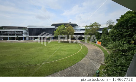 this is NUS University Town, welcoming visitors and building around them  134667738