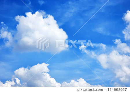 Blue Sky with Fluffy White Cumulus Clouds. Blue Sky with Fluffy White Cumulus Clouds. 134668057