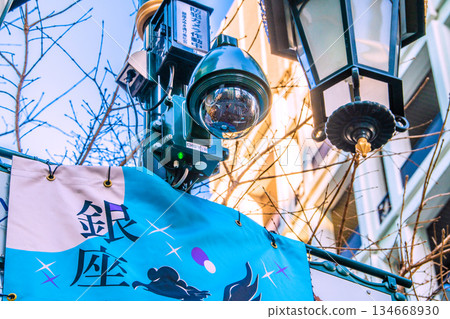 Tokyo cityscape in Japan. Security cameras in operation on street corners. Security cameras on Ginza Miyuki Street. 134668930