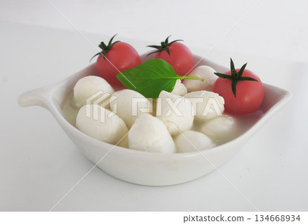 Tomato and mozzarella basil Tomato and mozzarella basil 134668934