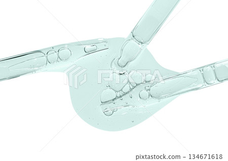 A sample of facial serum or gel or moisturizer with a pipette. Isolated on white. A sample of facial serum or gel or moisturizer with a pipette. Isolated on white. 134671618