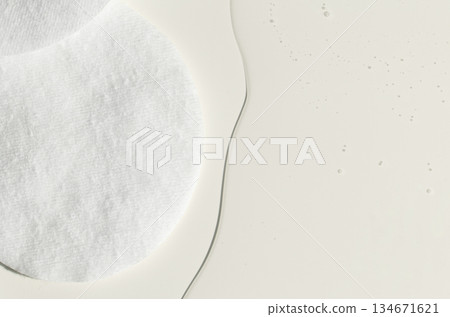 A cotton pad for removing makeup and micellar water. A cotton pad for removing makeup and micellar water. 134671621
